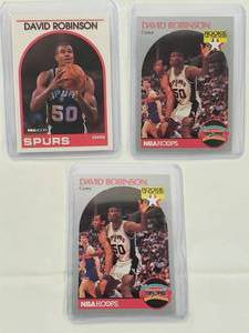 lot 40 image: Lot of 3 David Robinson Rookie Cards 2x 1990 NBA Hoops Rookie of the Year No. 270, 1989 NBA Hoops No. 310