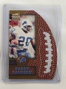 lot 52 image: Barry Sanders 1999 Pacific Trading Aurora Die Cut No. 7