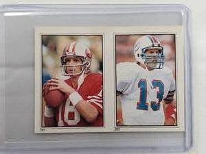lot 95 image: 1985 Topps Sticker Joe Montana No. 282, Dan Marino No. 283