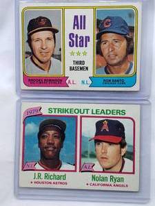 lot 178 image: Lot of 2 1974 Topps No. 334 All Star Third Basemen Brooks Robinson, Ron Santo & 1979 Strikeout Leaders J.R. Richard and Nolan Ryan Topps No. 206