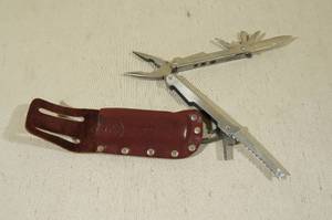 lot 34 image: American Camper Multi Tool with Leather Belt Case