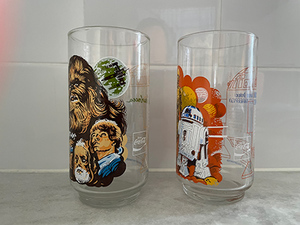 lot 39 image: 2 Burger King Star Wars Glasses, Chewbacca  R2D2 & C3P0