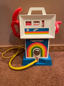lot 77 image: Vintage Fisher Price Childrens Gas Pump