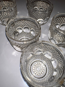 lot 125 image: Crystal tea cups, small cracks shown. Wood and brass pepper grinder