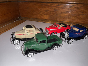 lot 131 image: 124 Licensed Ford Roadster, Cabriolet,134 Ford licensed Pickup, Tootsietoy Firebird and Camaro