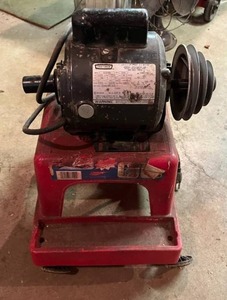 lot 24 image: Working Craftsman 12 Horsepower Motor with Cart