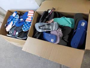 lot 317 image: 2 Boxes of Flip Flops- mens and wom...