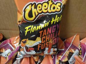 lot 401 image: Case of 32 2.75 bags cheetos Flamin...