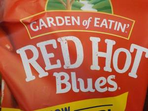 lot 407 image: Case of 12 bags Red Hot Blue Chips