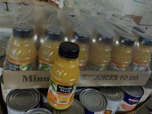 lot 447 image: 24 count 10 oz Minute Maid Orange J...