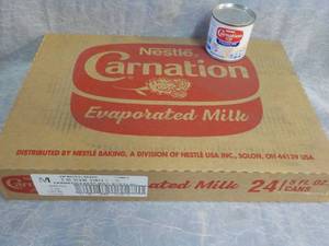 lot 72 image: Tray of 24 - 5 oz Cans Nestle Carna...