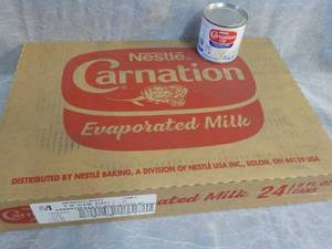 lot 75 image: Tray of 24 - 5 oz Cans Nestle Carna...