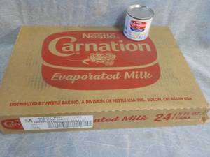 lot 78 image: Tray of 24 - 5 oz Cans Nestle Carna...
