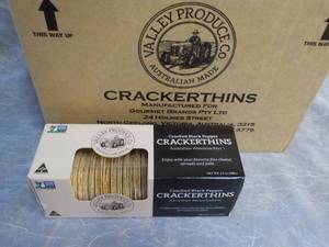 lot 93 image: Case of 12 Boxes Cracker Thins from...