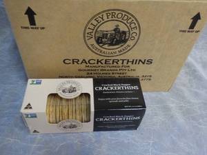 lot 94 image: Case of 12 Boxes Cracker Thins from...