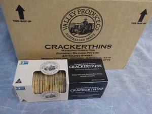lot 95 image: Case of 12 Boxes Cracker Thins from...