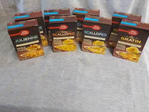 lot 145 image: 8 Boxes Betty Crocker Potatoes Meals - 2 ach Juliene, Cheesy Scalloped, Scalloped, and AuGratin best date 07262023
