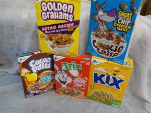 lot 169 image: 5 Boxes of Cereal- 1 each Golden Grahams, Cookie Crisp, Coco Puffs, Trix and Kix some past best date