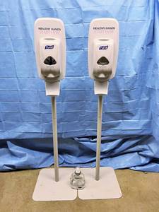lot 18 image: MSRP $600 Lot of 2 Purell Touch Free Automatic Hand Sanitizer Dispenser &amp Stand With&nbspExtra Bottle Of Sanitizer Both Great Working Condition&nbsp