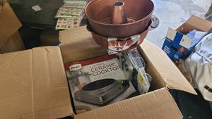 Box of kitchen goods like Ceramic Cooktops and more