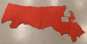 lot 70 image: Half Cow Remnant Red Color Real Leather Approx. 60 Inch X26 Inch