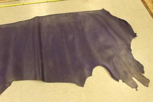 lot 74 image: Real Leather Have Cow Remnant Purple Color Measure Apprx. 94 Inch X 33 Inch