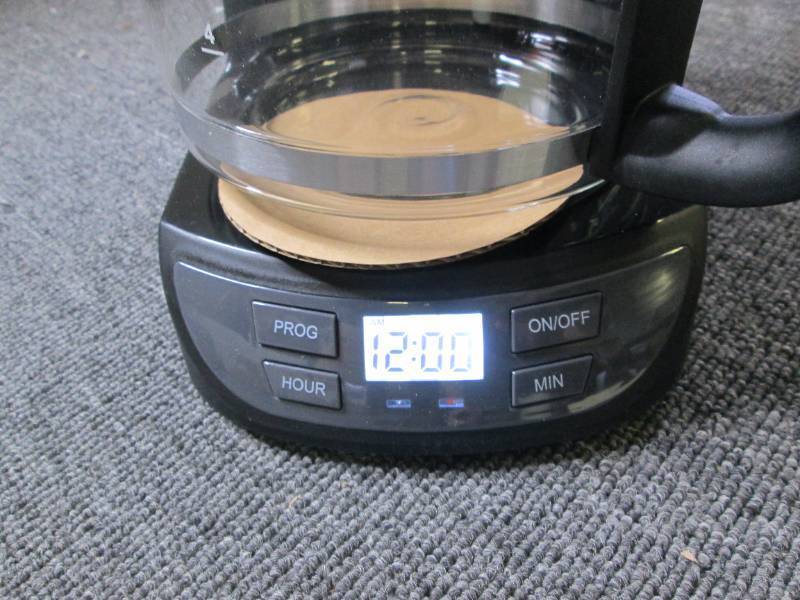 12 cup coffee maker powers on ...