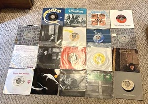 lot 29 image: Vintage 45 RPM Vinyl Lot - Metallica, Aerosmith, U2 and More