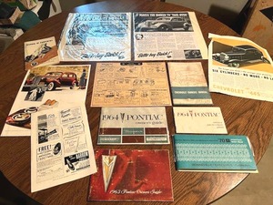 lot 85 image: Amazing Lot of Vintage Car Owners Manuals, Advertisements, and More