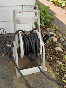 lot 146 image: Hose Reel and 25 Black Hose