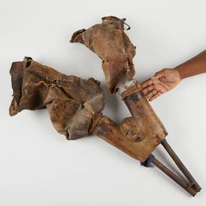 lot 292 image: African Bamana Bellows with Carved Face