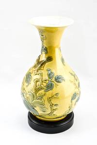 lot 204 image: Lladro Yellow Ceramic Vase on Wood Base