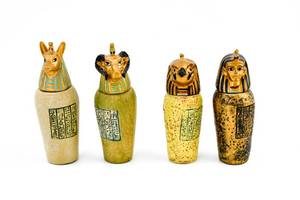 lot 291 image: Group of Four Miniature Egyptian Style Canopic Jars