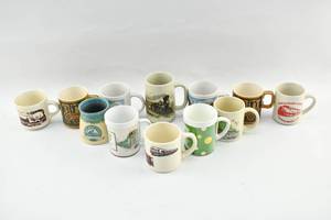lot 295 image: 12 Train Mugs