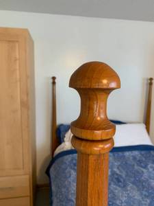 lot 83 image: Warm Wood Four Poster Queen Bed
