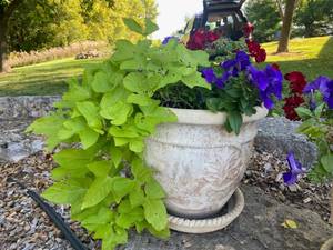 lot 2 image: Two Sculpted Clay Planters