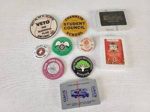 lot 75 image: Vintage Mankato West Buttons, Gags Camper Way Playing Cards and More