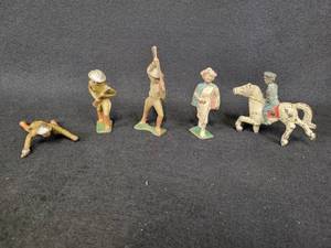 lot 88 image: (5) Vintage Cast Iron Toy Soldiers