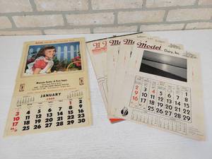 lot 102 image: 1960 Minnesota Poultry & Farm Supply Calendar - Mankato, MN and Assorted Model Dairy Calendar pages from 1939 to 1941