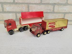 lot 118 image: Vintage BuddyL and REMCO Coca-Cola Semi-Trucks