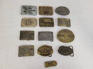 lot 124 image: (12) Vintage Belt Buckles and Marlboro Money Clip - Challenger Shuttle Commemorative, New Holland, McKay Empire, Schlitz and More
