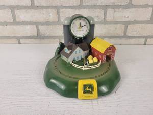 lot 130 image: John Deere Clock - Clock and Sounds Work, Tractor is Missing