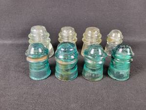 lot 144 image: (8) Antique Glass electrical Insulators