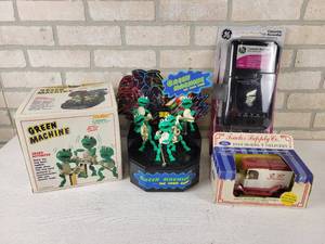 lot 155 image: 1989 Green Machine Sound Activated Frog Band (Not Working), Vintage Tape recorder and Tractor Supply Co. 1913 Model T Delivery Bank Model