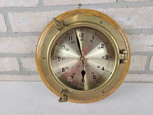 lot 192 image: Porthole Ships Clock