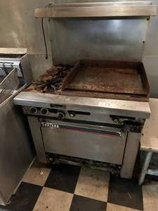 lot 17 image: Garland LP Stove - 36W x 34D x 59H - Working Condition