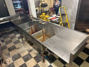 lot 40 image: Three Basin Stainless Steel Sink and Countertop Unit - 139W x 27D x 38H