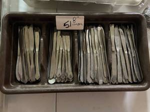 lot 51 image: Big Lot of Stainless Steel Butter Knives with Utensil Tub - Over 100 Pieces