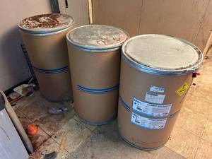 lot 72 image: Lot of Barreled Commercial Laundry Detergent - Two are Full, Unopened, and One at about 14