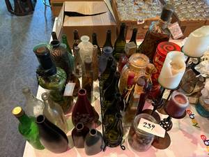 lot 239 image: Large Assortment of Bottles, Candles, Vases